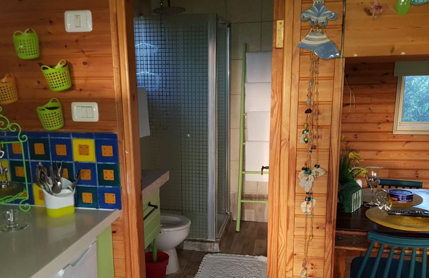 ביקתפוז וקלמנטינה- מתחם בקתות וסוויטות עם ג'קוזי פרטי ובריכה משותפת 호텔 리만 객실 사진